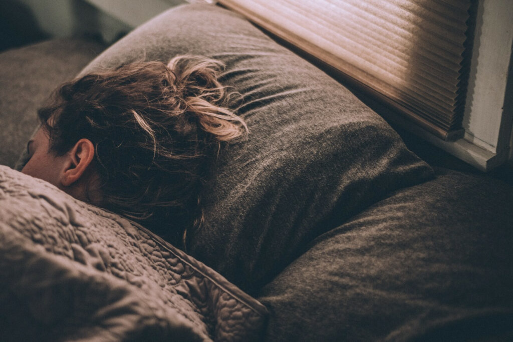 Woman sleeping for Autoimmune Disease and Mental Health