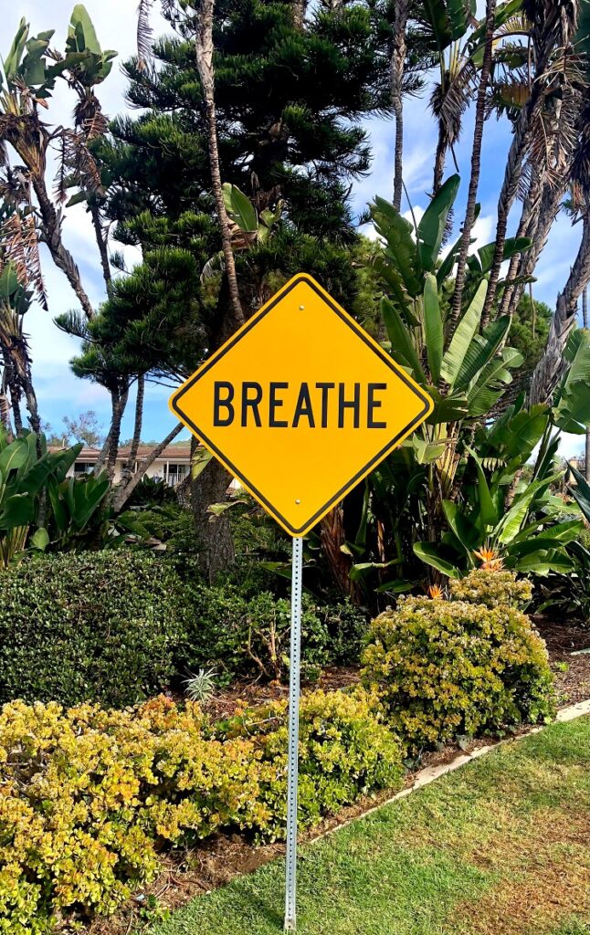 Yield sign that says Breathe instead of Yield